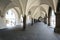 Arcades under the townhall of Luebeck, Germany, historic architecture at the market place in the old town in the city center, copy