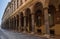 The arcades of Via Zamboni, University Area, in old Bologna city center. Italy