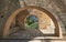 Arcadi monastery in Crete, Greece, stone arches in monastery garden