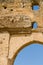 Arch of ancient Merenid tombs overlooking the arabic city Fez, Morocco, Africa