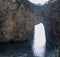Arch of the blue grotto of the Tyrrhenian Sea against the horizon. Amazing blue waters of the sea near the blue grotto from the