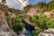 Arch bridge over the Koprucay river gorge in Koprulu national Park in Turkey. Panoramic scenic view of the canyon and blue