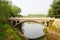 An arch bridge on a river