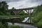 Arch bridge viaduct in Lithuania. Transportation train nature travel concept