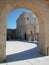 Arch and church