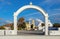 Arch, church and bell towers in Oia village, Santorini island, G