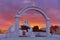 Arch, church and bell towers in Oia village, Santorini island, G