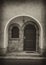 Arch door and wall in sepia