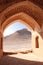 Arch at the entrance to Zoroastrian ceremonial complex with Towers of Silence, were used for burial ceremonies, Yazd,