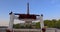 Arch with flowers in front of the Eiffel Tower in Paris. Establishing shot man making surprise proposal of marriage to