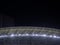 Arch of the football stadium. Football match lighting. Part of a sports facility. Sports complex engineering