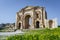 Arch of Hadrian at the roman ruins of Jerash, Jordan. It features some unconventional, po