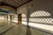 Arch leading into courtyard, Bahia Palace, Morocco