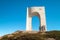 The arch of liberty monument on a sunny day situated on the top of Goraltepe mountain near Beklemeto pass in Bulgaria. Balkan