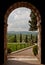 Arch monastery overlooking the Tuscan hills