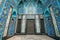 The arch of the mosque in blue tones is made from the mosaic of the Islamic religion.