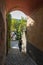 Arch & narrow street on Pescatore island, Lake Maggiore, Italy