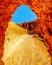 Arch opening in the Vermilion Colored Hoodoos on the Navajo Trail in Bryce Canyon