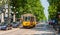 Arch of Peace view with nostalgic tram in Milano, Italy