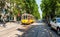 Arch of Peace view with nostalgic tram in Milano, Italy