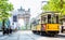 Arch of Peace view with nostalgic tram in Milano, Italy