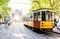 Arch of Peace view with nostalgic yellow tram in MILANO, ITALY