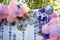 Arch of pink and purple balloons for girl happy birthday party. Outdoors summer event. Festive decorative elements