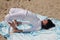 Arch pose Yoga at the beach