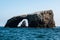 Arch Rock Natural Bridge and Volcanic Rock Formation in Background at Anacapa Island