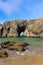 Arch in sea stacks along Oregon coast , where colonies of shore birds nest