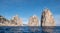 Arch in sea stacks off coast of Capri, Italy. They are named Stella, Faraglione di Mezzo with the arch, and Fraglione di Furori.