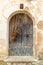 Arch shaped old wooden door