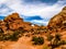 An arch that is standing apart from the other red rocks, Arches National Park, UT, USA