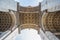 Arch of Triumph from below in Paris, France.