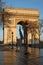 Arch of Triumph building from Paris, France, during a beautiful spring sunrise. Photo taken from Champs Elysee boulevard. Landmark