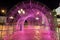 Arch tunnel walkway decorated with pink light