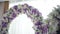 Arch for the wedding ceremony. Arch decorated with natural flowers