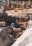 Archaeologist at work on the site of prehistoric onuments of Men