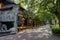 Archaised Chinese buildings along shady street in morning