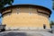 Archaised circular earthen dwelling building in style of Fujian