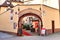 Arched bow gate with entrance to French hote `le Bouclier D`Or` in old hostorical building in city Strasbourg