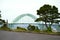 Arched bridge connecting shores bay of Pacific Ocean Newport Ore