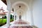 Arched colonade hallway at Sambata de Sus monastery in Transylva