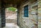 Arched door and stone wall