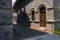 Arched door and windows of archaised building