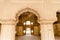 Arched doorway of the historic Orchha Fort in India, with its intricate architecture