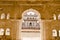 Arched doorway of the historic Orchha Fort in India, with its intricate architecture