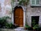 Arched entrance door Tuscany italy