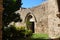 The arched entrance in the stunning Bellapais Abbey. White Abbey, the Abbey of the Beautiful world. Kyrenia. Cyprus