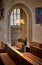 Arched entrance to the side chapel and benches. in Severin church in Erfurt